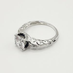 Round Cut Swirl Ring with Blue Accents